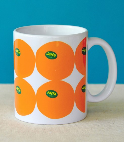 White Ceramic Mug with Jaffa Orange Design by Barbara Shaw